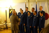 Cadets listening to the National Anthems performance
